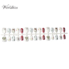 Ensemble de presse à ongles de Noël – Motif flocon de neige rouge et blanc avec colle et lime